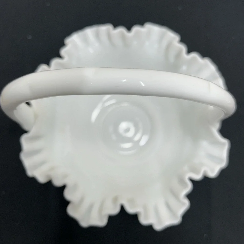 Vintage Fenton Hobnail White Milk Glass Basket with a ruffled edge and handle